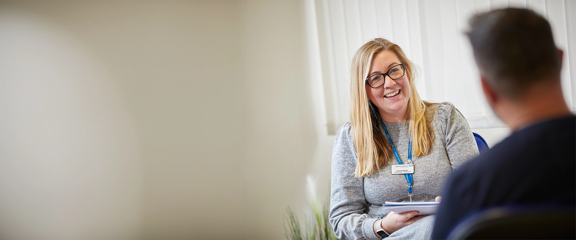 Therapist Smiling At Service User