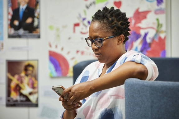 Woman Looking At Phone